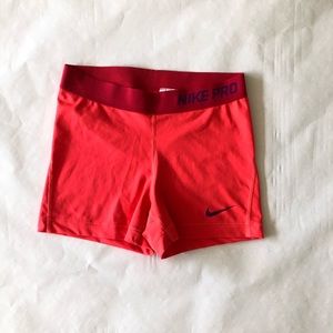 Hot pink/ orange Nike pro shorts